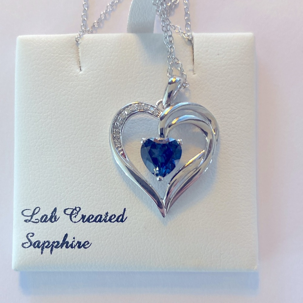 New heart shaped necklace with lab created sapphire and diamond accent